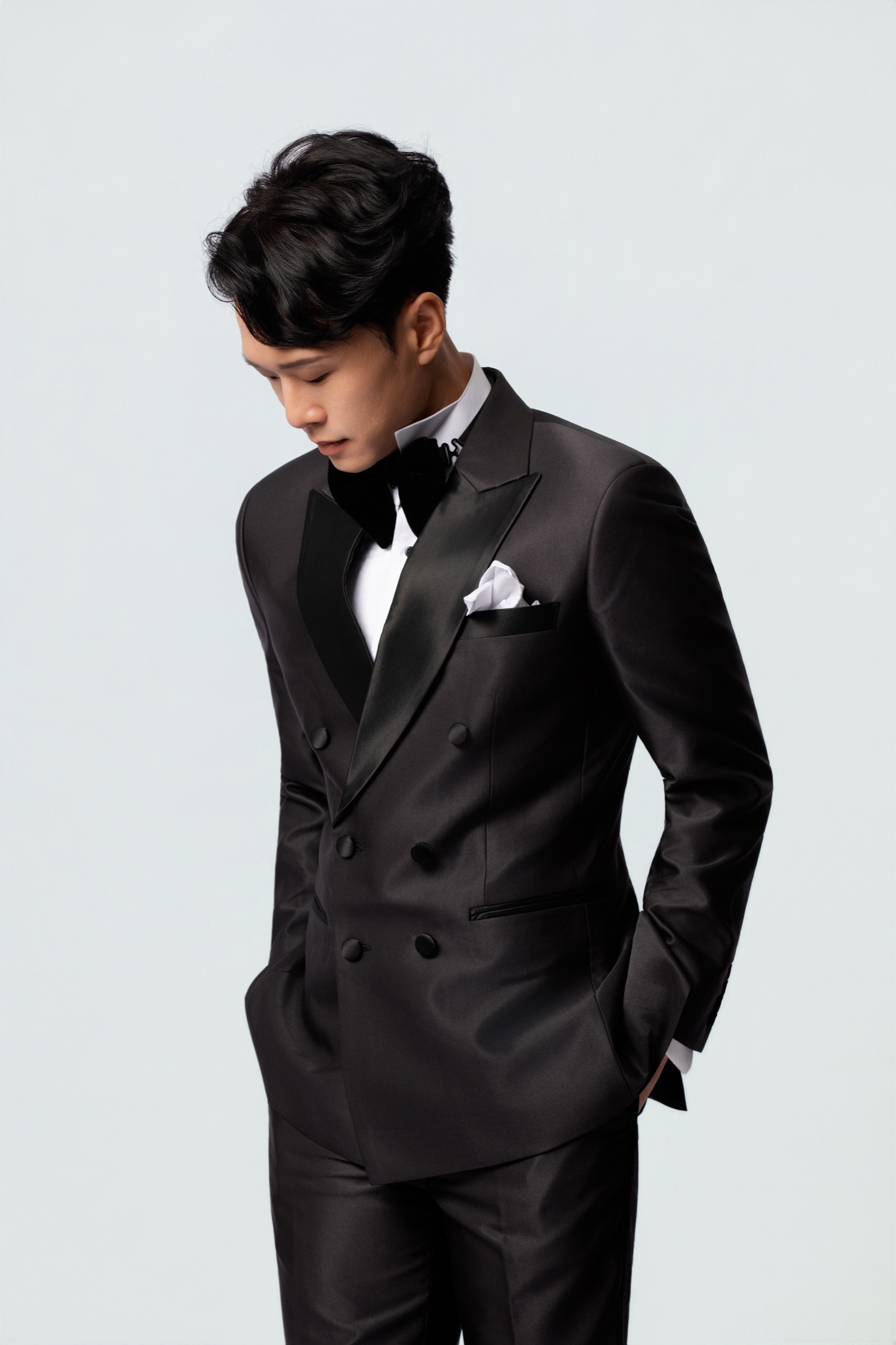 Jackie See in a black tuxedo for gala events